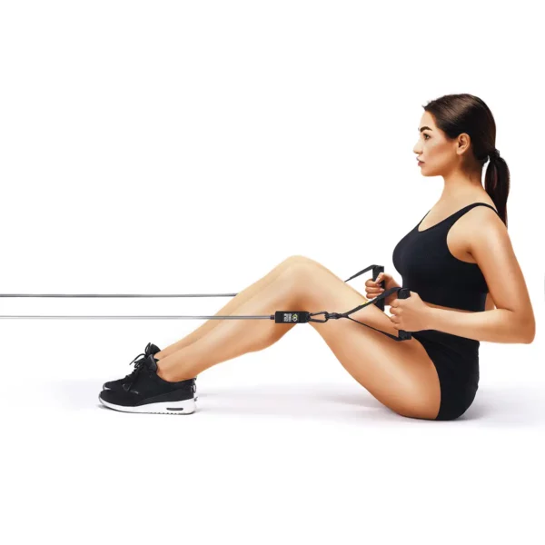 Femme s'entraînant avec des élastiques de musculation - Exercices avec élastique de musculation